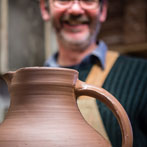 Doug Fitch and Hannah McAndrew making a jug for me